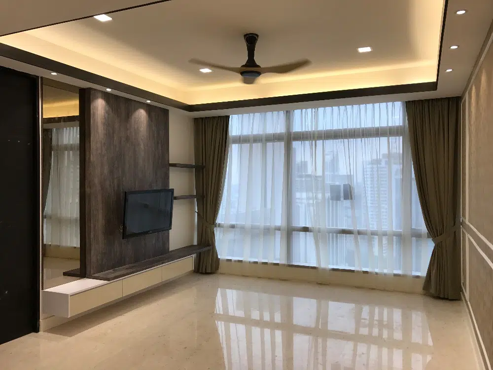 Mirrored and dark wood TV cabinet design in Banyan Tree Pavilion, Kuala Lumpur