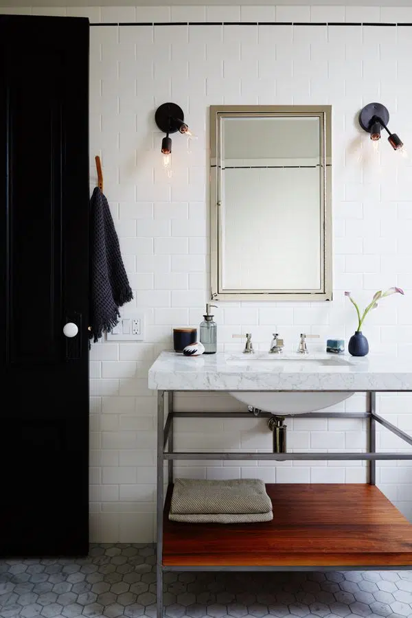 Marble sink with exposed shelf frame