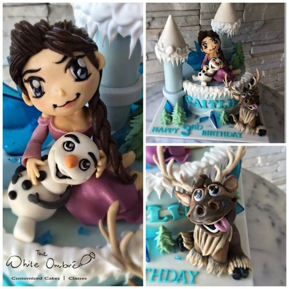 Frozen themed cake with handmade edible figurines of Anna, Olaf and Sven. Pulse Patisserie. Source