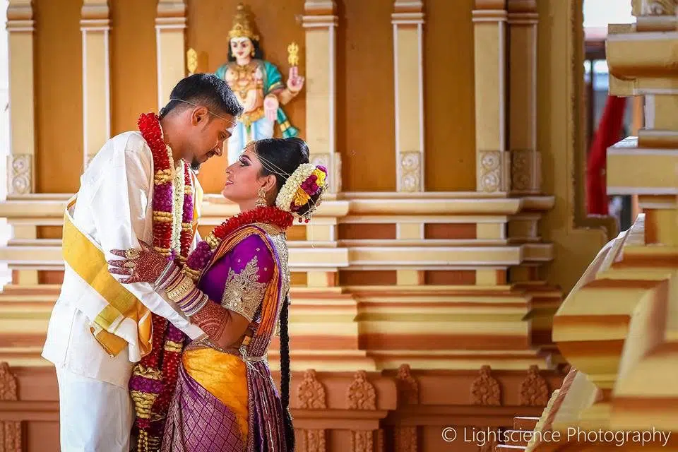 Malaysian Indian wedding couple in temple by Lightscience Photography. Find Malaysia's Best Wedding Photographers at Recommend.my
