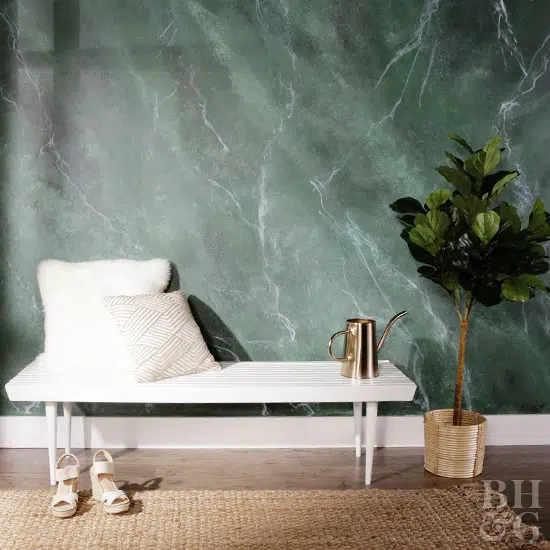 faux marble painting is one of the many DIY wall painting ideas that's relatively inexpensive yet beautiful
