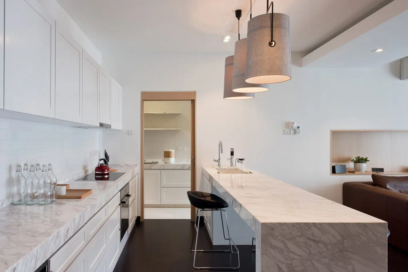 Above: Marble island and cabinet counter for home in Tropicana by Pocket Square