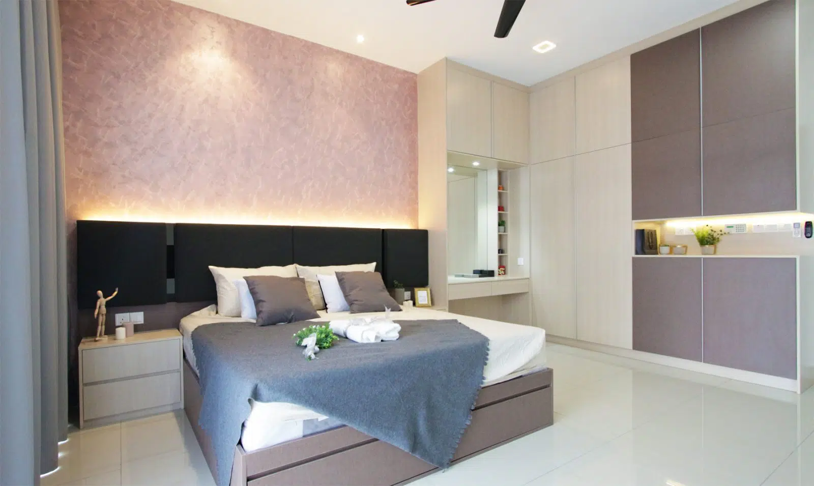 master bedroom with pink textured paint. Project was done by R.Works in Southville City