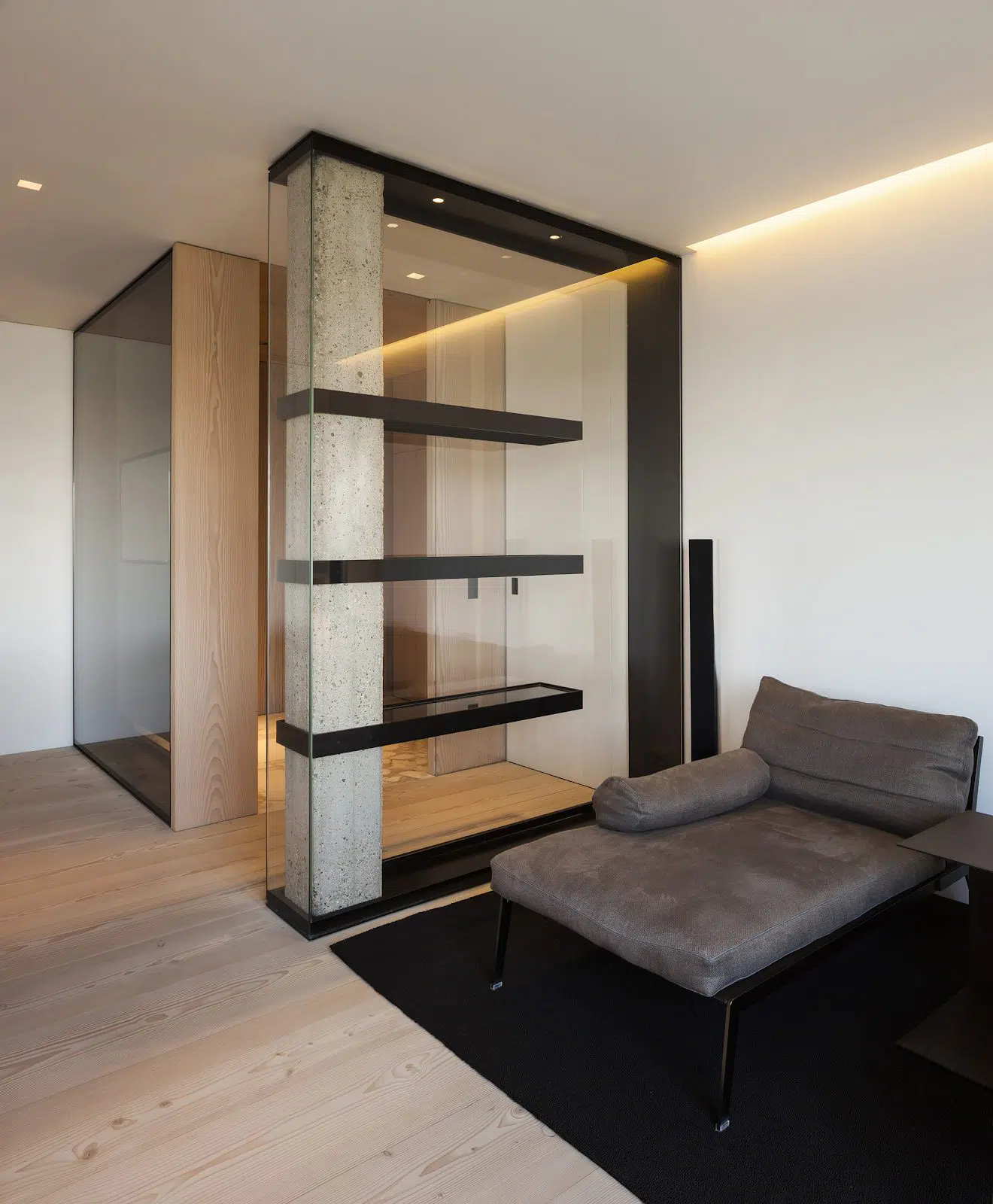 Glass display cabinet as entrance partition