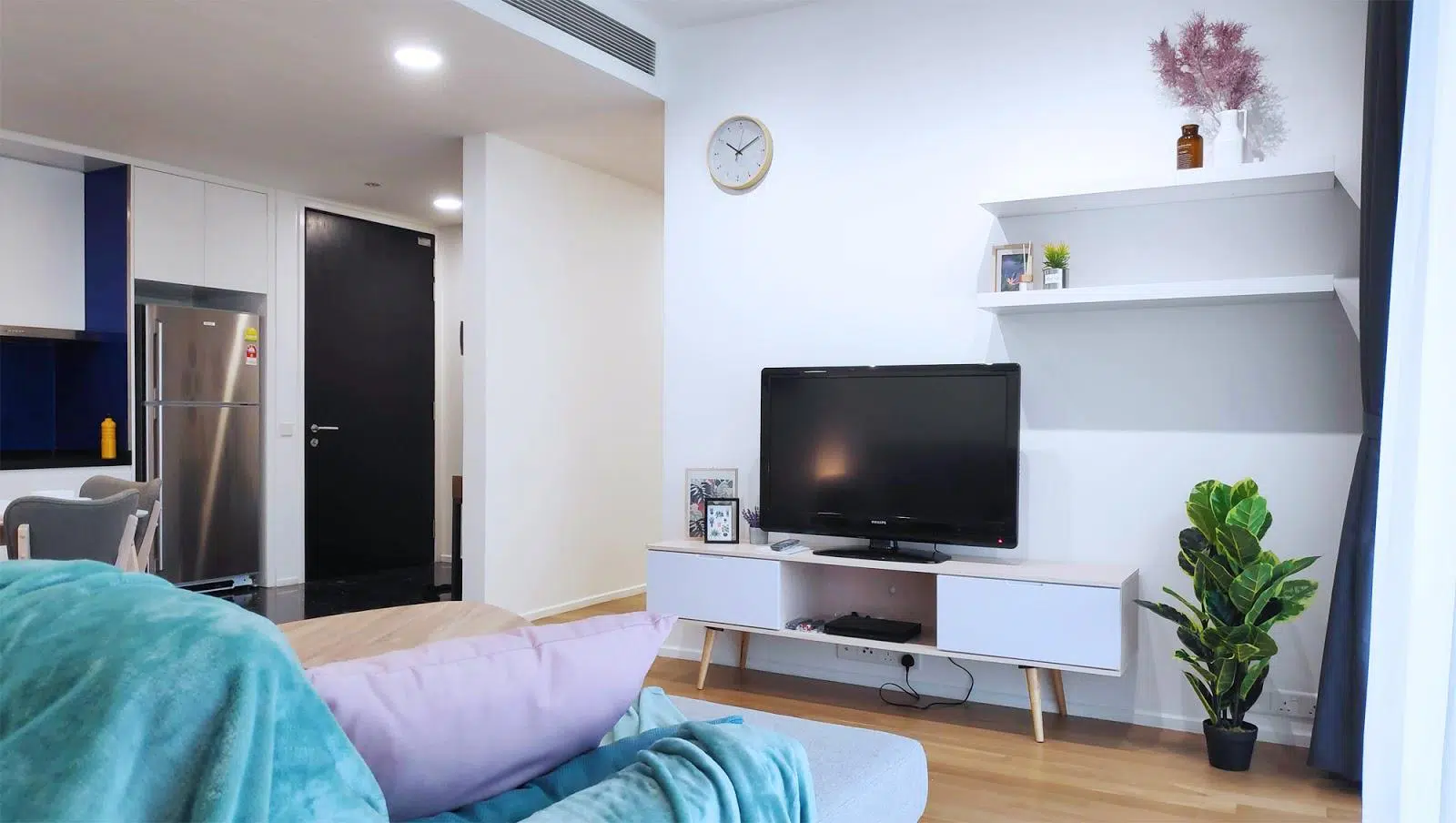 Scandinavian TV console with white shelves at the Arcoris unit, Mont Kiara