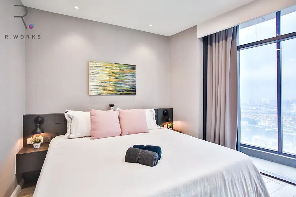 Nude pastel accents in the first bedroom at Empire City, Damansara