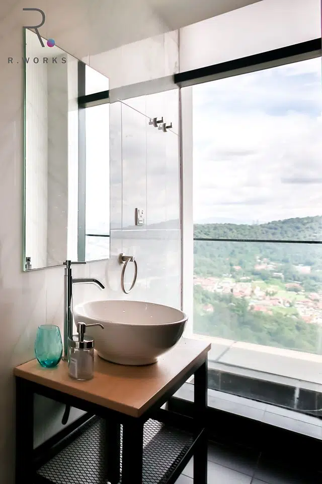 The master bedroom with a glass screen at the side at Empire City, Damansara