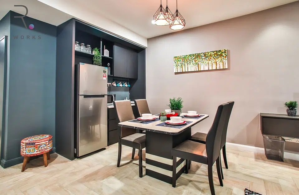 Dining table and kitchenette in the studio unit at Empire City, Damansara