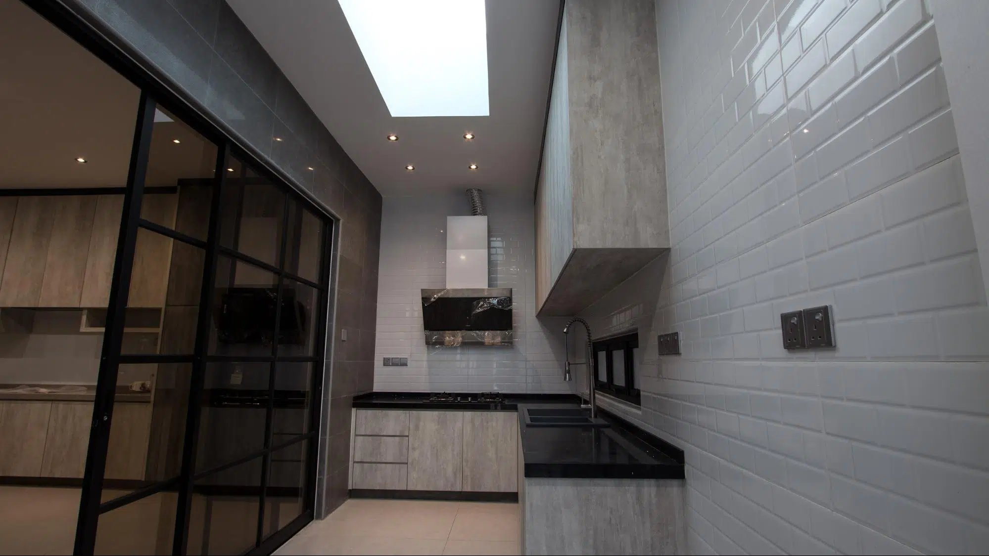 Modern industrial wet kitchen with soft white lighting 