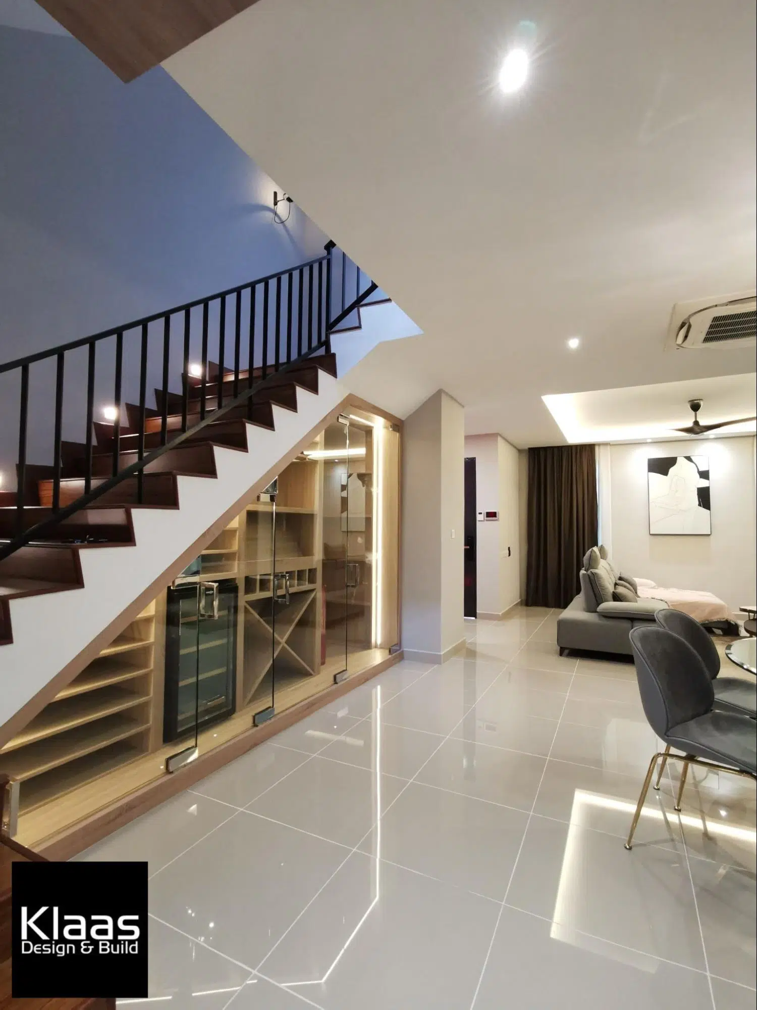 Custom-made wine cellar under staircase 