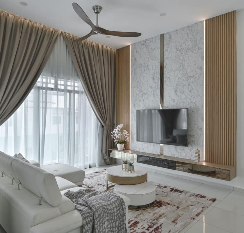 Gorgeous full-height curtains complete the look of this living room in BJB Height Residences, Melaka. By Klaasmen